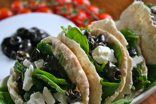 Warm Yorkshire Fettle, Baby Spinach & Olive Pitta Breads